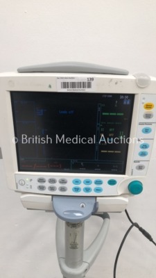 Datex-Ohmeda S/5 FM F-FMW-00 Patient Monitor on Stand with 1 x E-PSM-00 Module with NIBP,T1,T2,SpO2 and ECG Options (Powers Up) * SN 6594764 / 6578295 - 2
