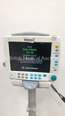 Datex-Ohmeda S/5 FM F-FMW-00 Patient Monitor on Stand with 1 x E-PSM-00 Module with NIBP,T1,T2,SpO2 and ECG Options (Powers Up) * SN 6591023 / 6487748 - 2