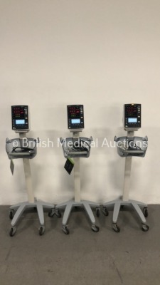 3 x Mindray Datascope Accutorr V Patient Monitors on Stands with 2 x BP Hoses and 3 x SpO2 Finger Sensors (All Power Up) * SN A7515871C2 / A7515873C2