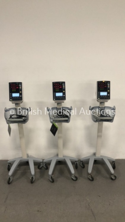 3 x Mindray Datascope Accutorr V Patient Monitors on Stands with 2 x BP Hoses and 3 x SpO2 Finger Sensors (All Power Up) * SN A7515871C2 / A7515873C2