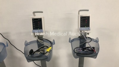 4 x Datascope Duo Patient Monitors on Stands with 3 x SPO2 Finger Sensor and 3 x BP Hoses (All Power Up) *S/N MD01988-A5 / MD02159-B5 / MD06532-I7 / M - 3