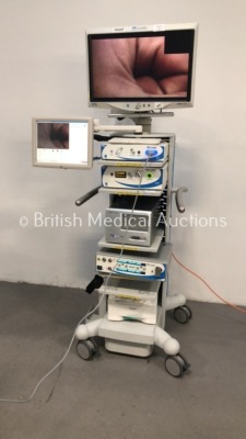 ConMed Linvatec Stack Trolley with ConMed Linvatec HD 1080p Monitor, MedXChange Touch Screen Monitor, ConMed Linvatec HD 1080p Camera Control Unit, Co
