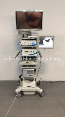 ConMed Linvatec Stack Trolley with ConMed Linvatec HD 1080p Monitor, MedXChange Touch Screen Monitor, ConMed Linvatec HD 1080p Camera Control Unit, Co