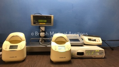 Mixed Lot Including 1 x Sartorius SEB Weighing Scales (Powers Up) 2 x Medela Calesca Warming / Thawing Devices (Both Power Up) 1 x Olympus Visera Pro