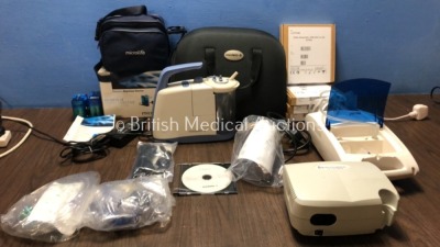 Mixed Lot Including 1 x Medela Clario Suction Pump with 2 x Cups, 1 x AC Power Supply, 1 x DC Power Supply and Instruction DVD In Carry Case (Powers U