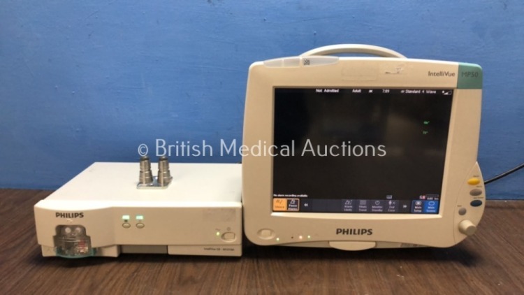 1 x Philips IntelliVue G5 M1019A Gas Module with Water Trap and 1 x Philips IntelliVue MP50 Patient Monitor (Both Power Up)