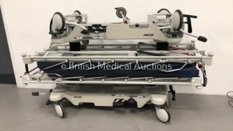 2 x Stryker Transport Hydraulic Patient Trolleys with 2 x Mattresses (Hydraulics Tested Working) * SN 0904 033596 / 0904 033546 *