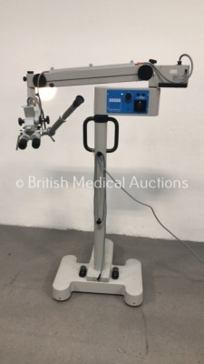 Carl Zeiss OPMI 11 Surgical Microscope with 2 x 10x/22B Eyepieces, Zeiss f-70 Binoculars, Zeiss f200 T* Lens and Training Arm on Zeiss S21 Stand (Powe