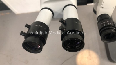 Leica Wild Heerbrugg M690 Dual Operated Surgical Microscope with 2 x Binoculars, 2 x 10x/21 Eyepieces, 2 x 8.33x/22 Eyepieces, f200mm SL Lens and 3 x - 4