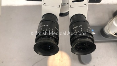 Leica Wild Heerbrugg M690 Dual Operated Surgical Microscope with 2 x Binoculars, 2 x 10x/21 Eyepieces, 2 x 8.33x/22 Eyepieces, f200mm SL Lens and 3 x - 5