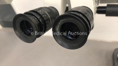 Leica Wild Heerbrugg M690 Dual Operated Surgical Microscope with 2 x Binoculars, 2 x 10x/21 Eyepieces, 2 x 8.33x/22 Eyepieces, f200mm SL Lens and 3 x - 6