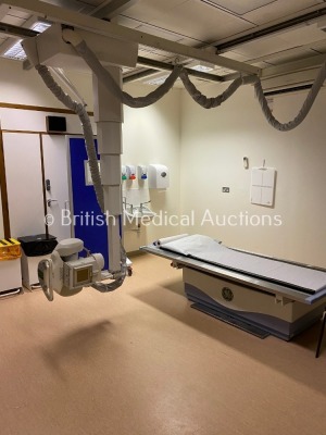 GE Proteus Bucky X-Ray Room *Mfd - 2003* Including X-Ray OTC, Tube/Tube Housing, Generator, Ceiling Runners, Console and Relevant Cables. The Unit was