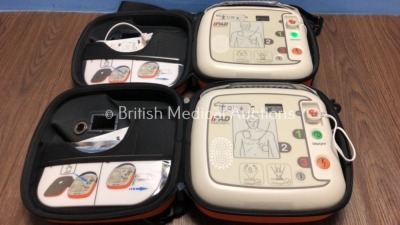 2 x CU Medical Systems Inc iPAD Intelligent Public Access Defibrillators with Batteries in Carry Cases *Mfd 2014* (Both Power Up)