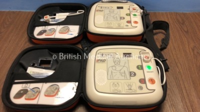 2 x CU Medical Systems Inc iPAD Intelligent Public Access Defibrillators with Batteries in Carry Cases *Mfd 2014* (Both Power Up)