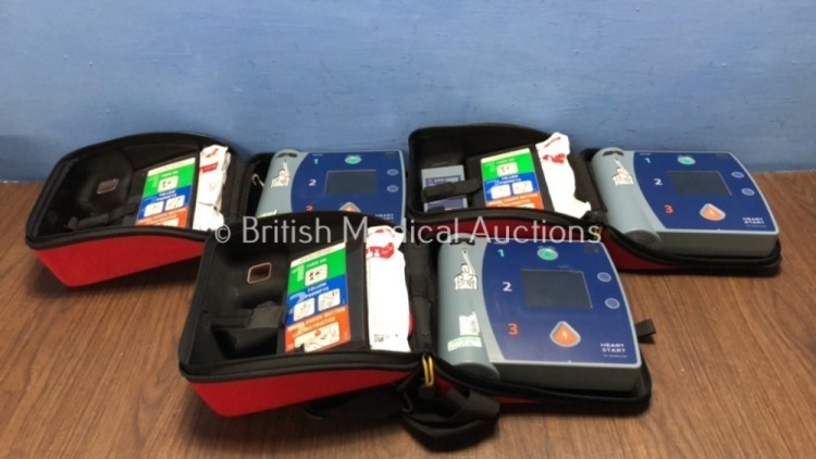 3 x Philips Heartstart FR2+ Defibrillators Including 3 x Philips M3863A Batteries (All Power Up)