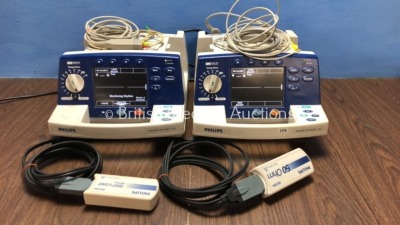 2 x Philips Heartstart XL Defibrillators Including Pacer, ECG and Printer Options with 2 x Paddle Leads, 2 x 3 Lead ECG Leads and 2 x Philips M3725A T