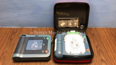 1 x Philips Heartstart HS1 Defibrillator and 1 x Philips Heartstart FRX Defibrillator (Both Power Up with Stock Battery - Not Included)