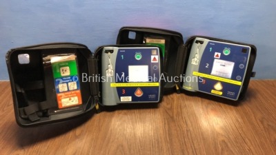 2 x Philips Heartstart FR2+ Defibrillators in Carry Cases (Both Power Up and Pass Self Test with Stock Batteries - Not Included)