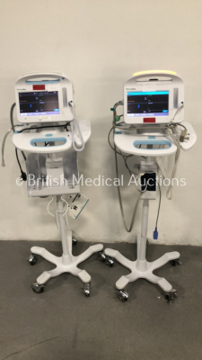 2 x Welch Allyn 6000 Series Patient Monitors on Stands with SPO2, BP and Temp Options and Leads (Both Power Up)