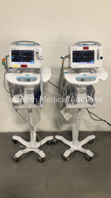 2 x Welch Allyn 6000 Series Patient Monitors on Stands with SPO2, BP and Temp Options and Leads (Both Power Up)