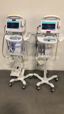 2 x Welch Allyn 6000 Series Patient Monitors on Stands with SPO2, BP and Temp Options and Leads (Both Power Up)