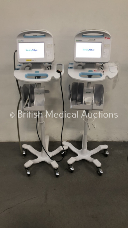 2 x Welch Allyn 6000 Series Patient Monitors on Stands with SPO2 and BP Options and Leads (Both Power Up)