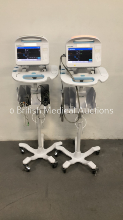 2 x Welch Allyn 6000 Series Patient Monitors on Stands with SPO2 and BP Options and Leads (Both Power Up)