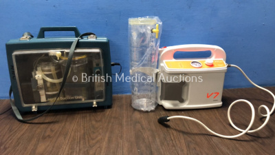 1 x Laerdal Suction Unit with 1 x AC Power Supply (No Power) 1 x Hersill V7 Plus b Suction Unit with DC Power Supply (Missing Cup Lid)