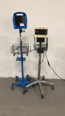 1 x GE ProCare Auscultatory Vital Signs Monitor (No Power) and 1 x Welch Allyn 52000 Series Vital Signs Monitor on Stand (Powers Up) *S/N 2019194-001*