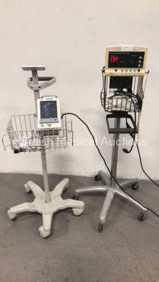 1 x Datascope Duo Patient Monitor (Broken Mounting Point with Stand) and 1 x Welch Allyn 52000 Series Vital Signs Monitors on Stand (1 x Powers Up)