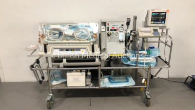 Drager Isolette TI500 Infant Transport Incubator with Philips IntelliVue MP5 Neonatal Monitor with Press, Temp, NBP, SPO2, ECG/Resp, CO2 and ECG/Defib