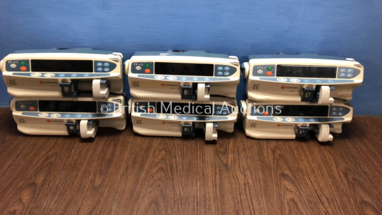 Job Lot of 6 x Carefusion Alaris CC Syringe Pumps (All Draw Power with Blank Screens) *800316583 / 800319616 / 800316193 / 800318816 / 800303445 / 800