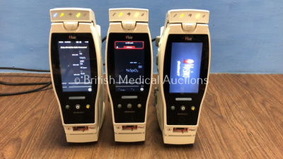 3 x Masimo Radical 7 Handheld Pulse CO-Oximeter with Docking Stations (All Power Up with Slightly Damaged Casing) *284193 / 165791 / 192962*