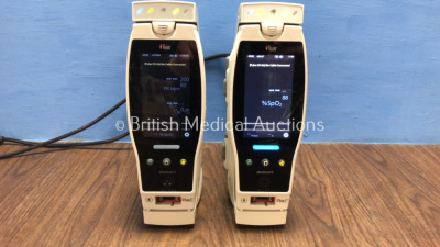 2 x Masimo Radical 7 Handheld Pulse CO-Oximeter with Docking Stations (Both Power Up with Slightly Damaged Casing) *260798 / 193459*