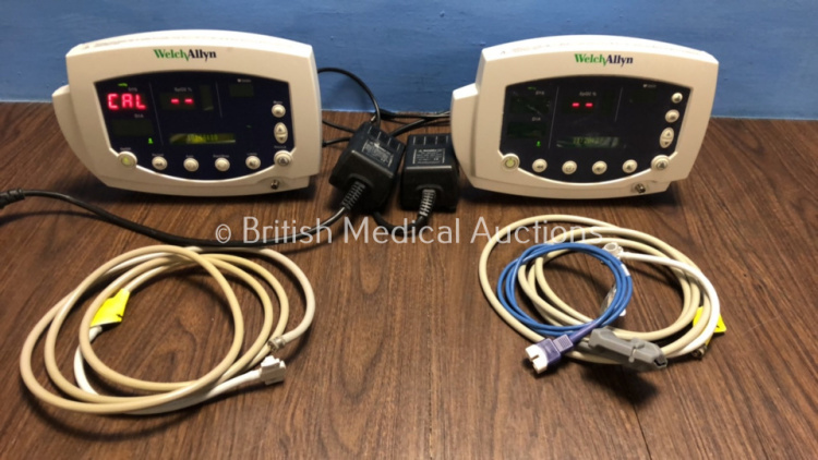 2 x Welch Allyn 53N00 Patient Monitor with 2 x Power Supplies 3 x SpO2 Finger Sensor and 2 x BP Hoses (All Power Up with Small Marks to 1 x Screen)