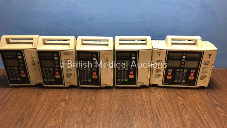 Job Lot Including 4 x Baxter Flo-Gard 6201 Volumetric Infusion Pumps and 1 x Baxter Flo-Gard 6301 Dual Channel Infusion Pump