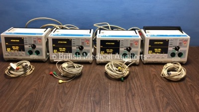 4 x Zoll M Series Defibrillators Including Pacer and ECG Options with 4 x Paddle Leads, 4 x 3 Lead ECG Leads and 4 x Batteries (All Power Up) *S/N T05