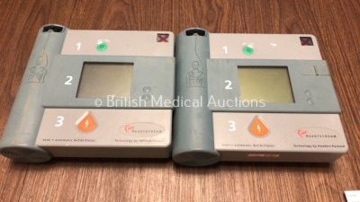 2 x Forerunner and 2 x Hewlett Packard Heartstream Semi-Automatic Defibrillators with 1 x Battery (Untested Due to Flat Battery) - 2