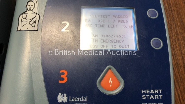 1 x Laerdal Heartstart FR2+ Defibrillator, 1 x Laerdal Heartstart FR2 Defibrillator and 1 x Philips Carry Case (Both Power Up and Pass Self Test with