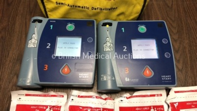 1 x Philips Heartstart FR2+ Defibrillator with 1 x Battery and 2 x Electrodes and 1 x Laerdal HeartStart FR2+ Defibrillator with 1 x Battery,2 x Elect - 2