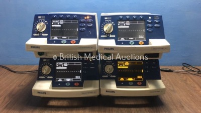 4 x Philips HeartStart XL Smart Biphasic Defibrillators with ECG and Printer Options (All Power Up) * SN US00461696 / US00124921 / US00591739 / US0044 - 2
