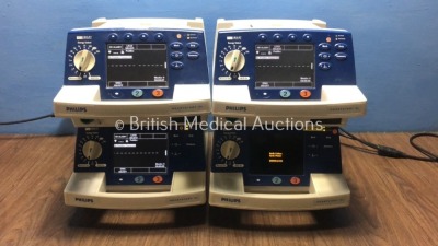 4 x Philips HeartStart XL Smart Biphasic Defibrillators with ECG and Printer Options (3 x Power Up, 1 x Powers Up with Defib Failure/Error) * SN US004 - 2