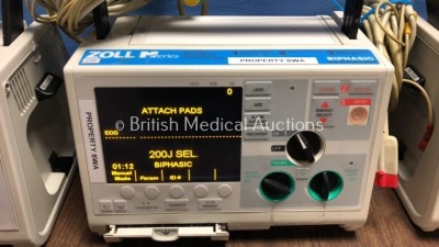 4 x Zoll M Series Defibrillators Including 1 x Pacer and 4 x ECG Options with 4 x Paddle Leads, 4 x 3 Lead ECG Leads and 4 x Batteries (All Power Up) - 4
