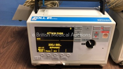 4 x Zoll M Series Defibrillators Including 1 x Pacer and 4 x ECG Options with 4 x Paddle Leads, 4 x 3 Lead ECG Leads and 4 x Batteries (All Power Up) - 5