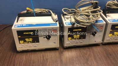 4 x Zoll M Series Defibrillators with EGG Option with 4 x Paddle Leads, 4 x 3 Lead ECG Leads and 4 x Batteries (All Power Up When Plugged in to Mains) - 3