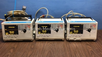 3 x Zoll M Series Defibrillators Including ECG Options with 3 x Paddle Leads, 1 x 3 Lead ECG Lead and 3 x Batteries (All Power Up) *S/N T07B87713 / T0