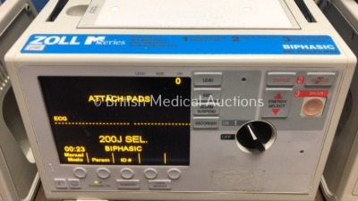 3 x Zoll M Series Defibrillators Including ECG Options with 3 x Paddle Leads, 1 x 3 Lead ECG Lead and 3 x Batteries (All Power Up) *S/N T07B87713 / T0 - 3