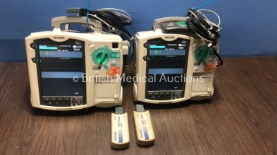 2 x Philips Heartstart MRx Defibrillators Including Pacer, ECG and Printer Option with 2 x Philips M3539A Batteries, 2 x Philips M3538 Module, 2 x Pad