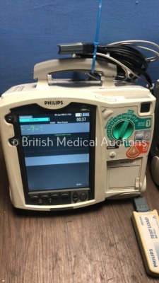 2 x Philips Heartstart MRx Defibrillators Including Pacer, ECG and Printer Option with 2 x Philips M3539A Batteries, 2 x Philips M3538 Module, 2 x Pad - 2