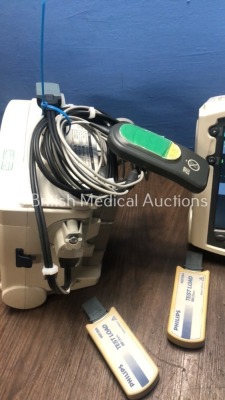 2 x Philips Heartstart MRx Defibrillators Including Pacer, ECG and Printer Option with 2 x Philips M3539A Batteries, 2 x Philips M3538 Module, 2 x Pad - 5